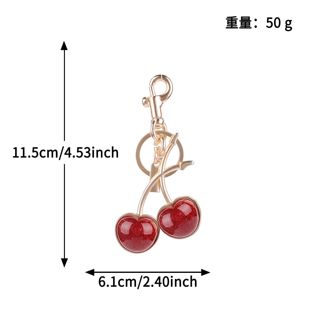 Transfronterizos directamente para bolsas de cereza colgantes de moda llaveras de automóviles llaveras de Amazon llaveras de metal accesorios de bolsas al por mayor