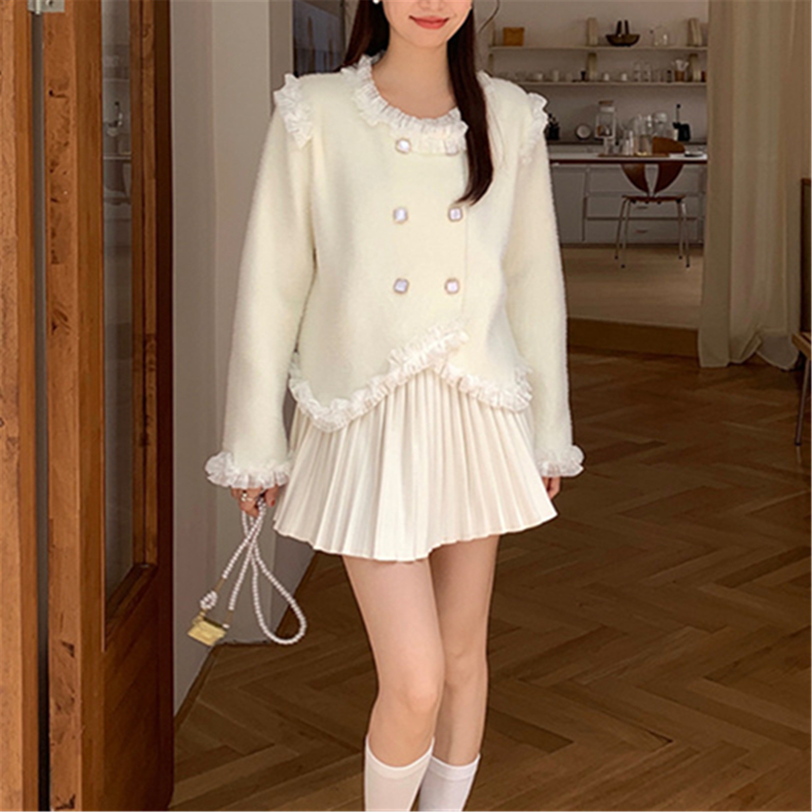 24 invierno Puyuan encantador viento fresco dulce imitación de cardigán de visón cuello redondo suelto camisa de estilo de mujer
