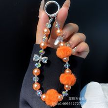 橙色毛绒球手机挂链diy手腕链条ccd相机钥匙扣挂饰珍珠蝴蝶结挂绳