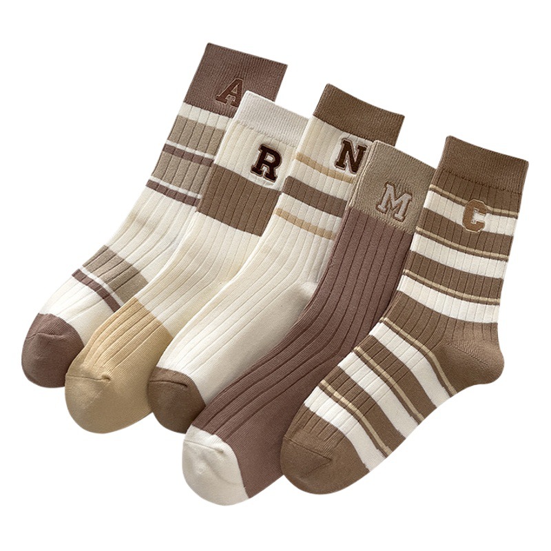 Calcetines de algodón de color sólido calcetines de invierno niñas ins moda Zhuji calcetines a media pierna bordados a rayas con doble aguja