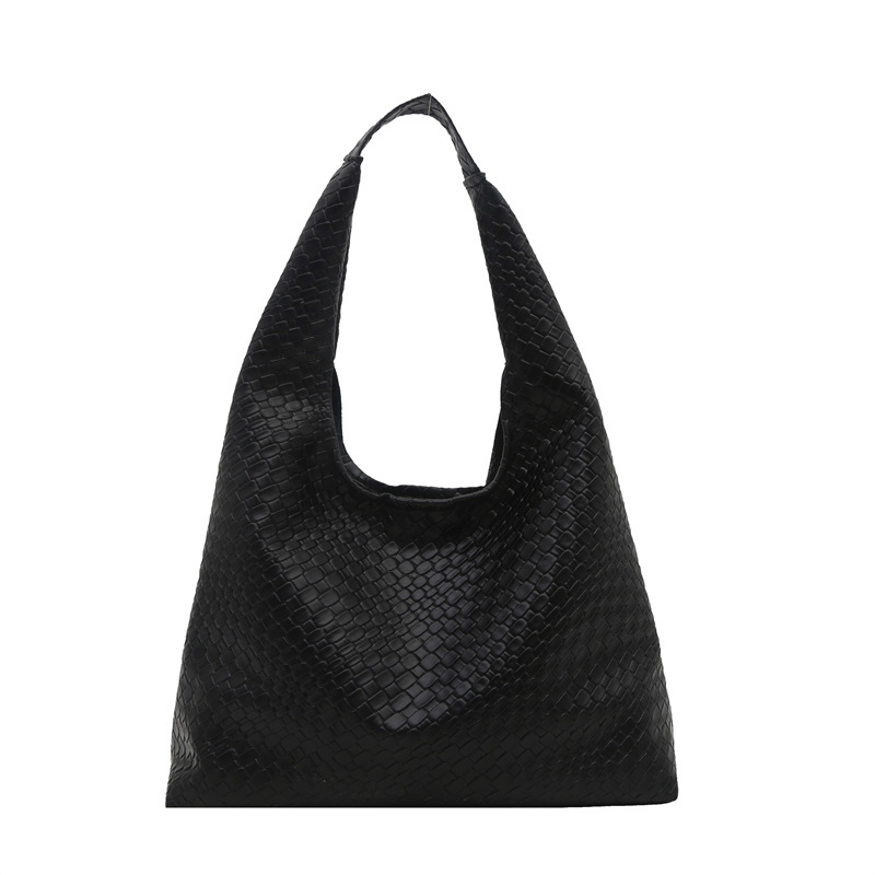 Casual diseño de gran capacidad de estilo extranjero bolso de hombro 2025 moda trenzado bolso de viaje simple retro bolso de brazo