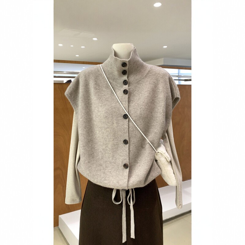 Korean-Style Stand-Up Collar Buttoned Sleeveless Knitted Vest with Drawstring Design Layered Vest Top 2026 Korean-Style Stand-Up Collar Buttoned Sleeveless Knitted Vest with Drawstring Design Layered Vest Top 2026