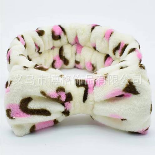 Europa y América leopardo punto ondulado coral veludo correa de cabello mariposa final correa de cabello lavado facial maquillaje turbante fábrica de cabello al por mayor