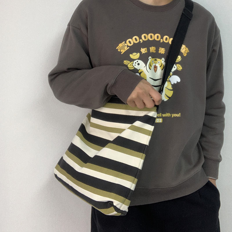 Nuevo Cruz-cuerpo bolsa de lona femenina de un solo hombro estudiante clase libro bolsa Bolsa de Comercio Exterior bolsa de la raya