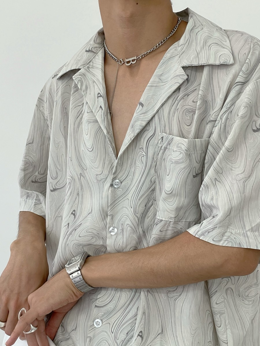 Camisa de manga corta con patrón de onda vintage de gama alta Camisa casual de textura de estilo occidental suelta perezosa de nicho de verano para hombres