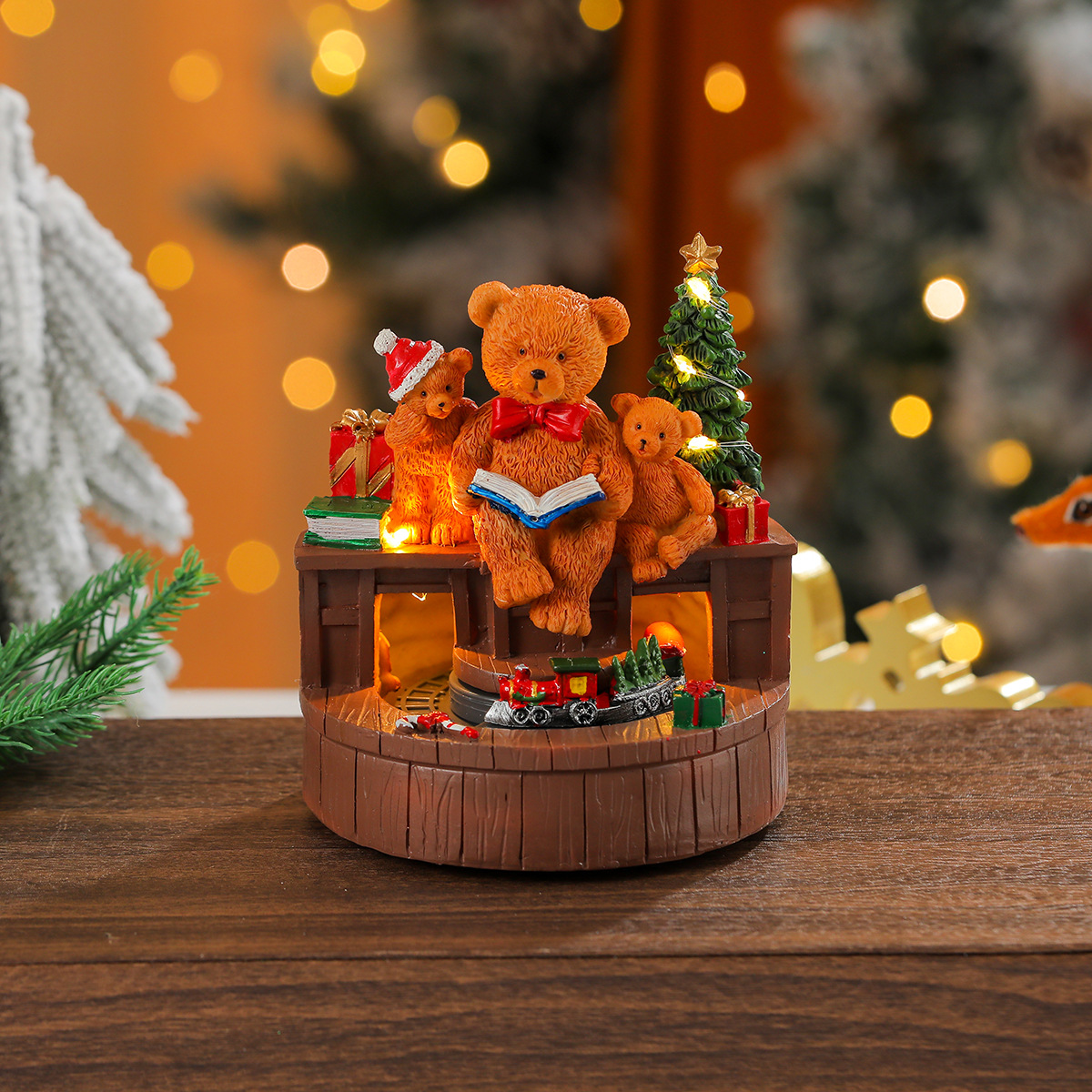 Una variedad de adornos de caja de música luminosa de resina giratoria de Navidad, adornos de tren giratorio, regalos de Navidad