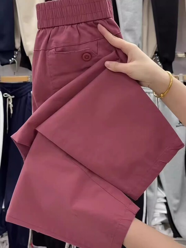 ヨーロッパの商品の夏の薄いタイプの9分のズボンの女性の新型の高弾性の綿のゆったりしている腰のハーレムのズボンの百合はやせているおばあさんのズボンを現します。|undefined