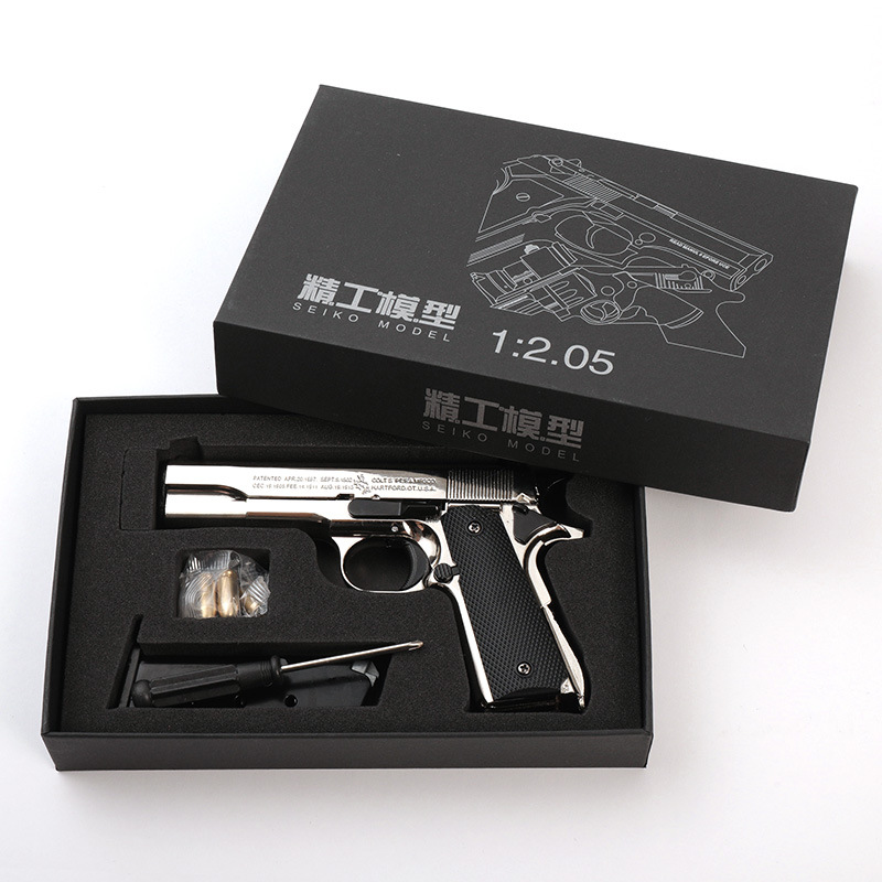 Modelo de aleación 1:2.05 de la pistola de juguete Seiko Colt M1911 con expulsión de casquillos, desmontable, ornamental, sin disparos.