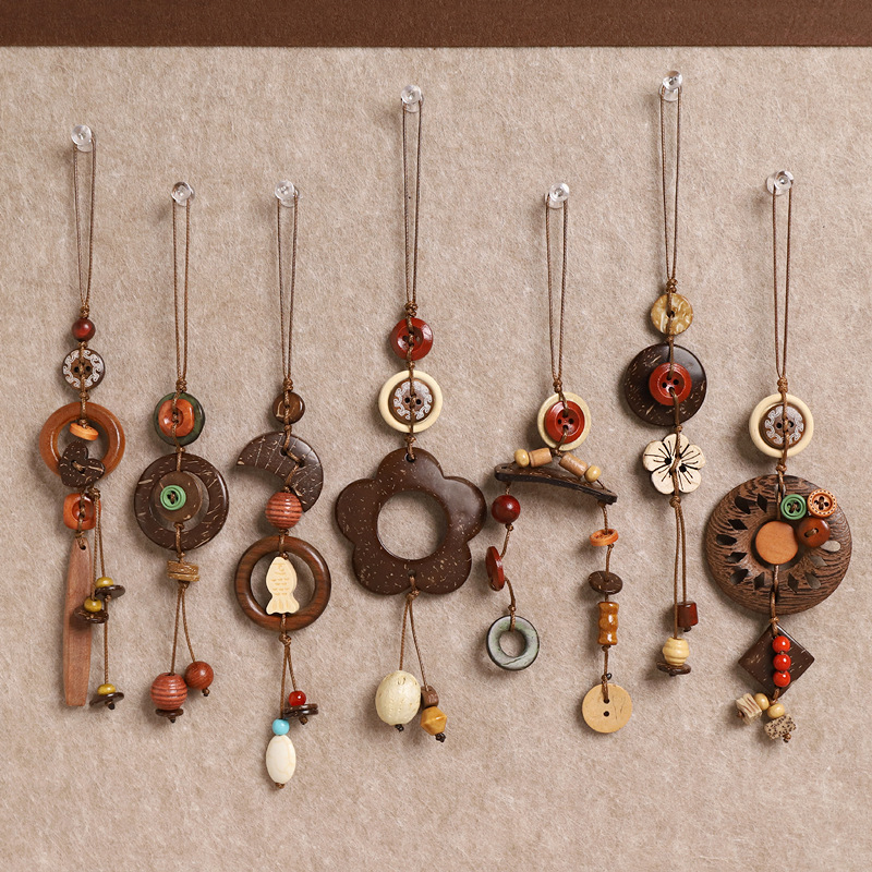 原创设计椰壳纽扣包包挂件手工编织串珠森系复古文艺创意包挂挂饰