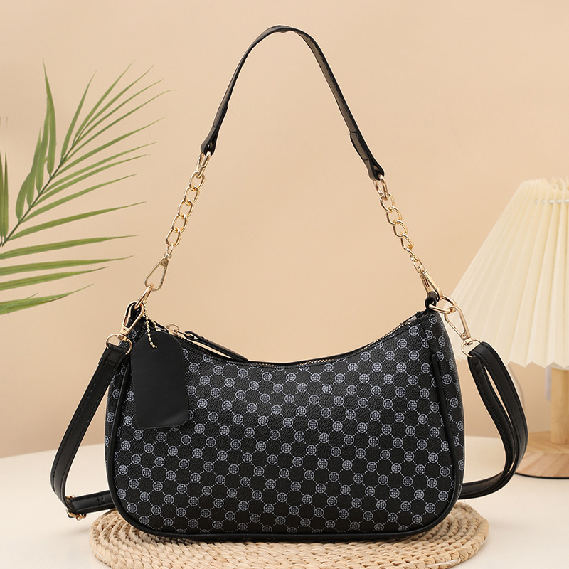 2025 nuevo bolso de mujer nuevo bolso de impresión personalidad bolso de hombro de moda bolso de maquillaje de viaje al comercio exterior lote