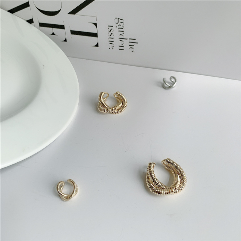 Fashion Geometric Cross Metal Winding Alloy Earrings Wholesale display picture 8
