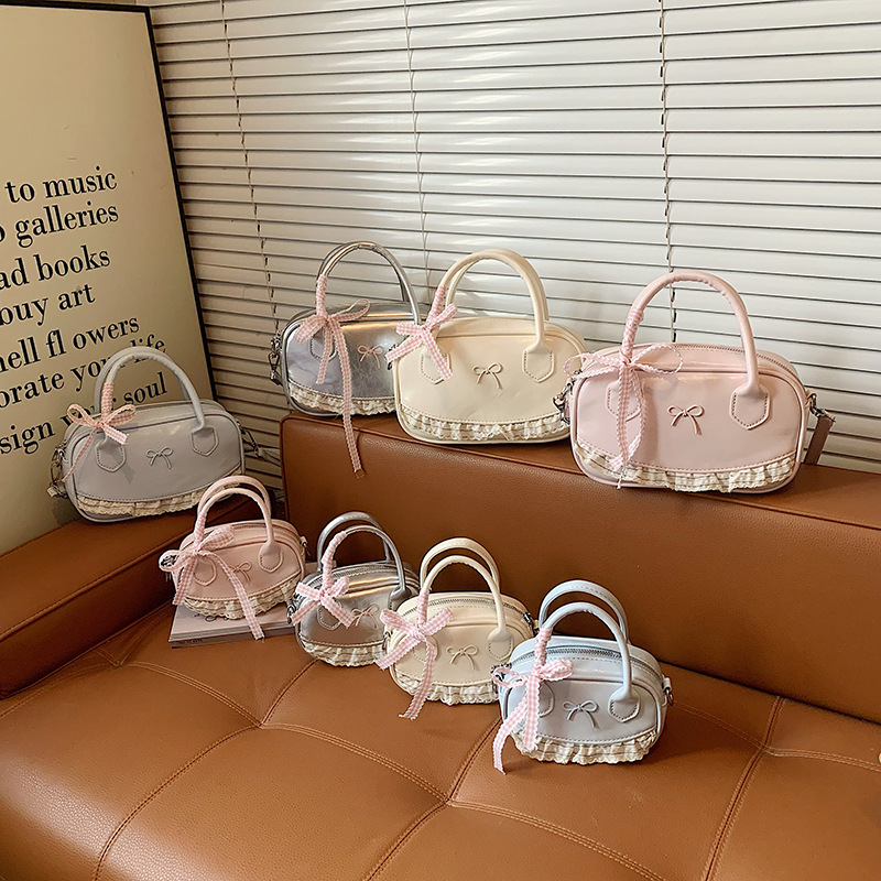 2026 nuevo bolso coreano para niños bolso de encaje de estilo extranjero bolso adorable arco bolso accesorios de niña pequeña