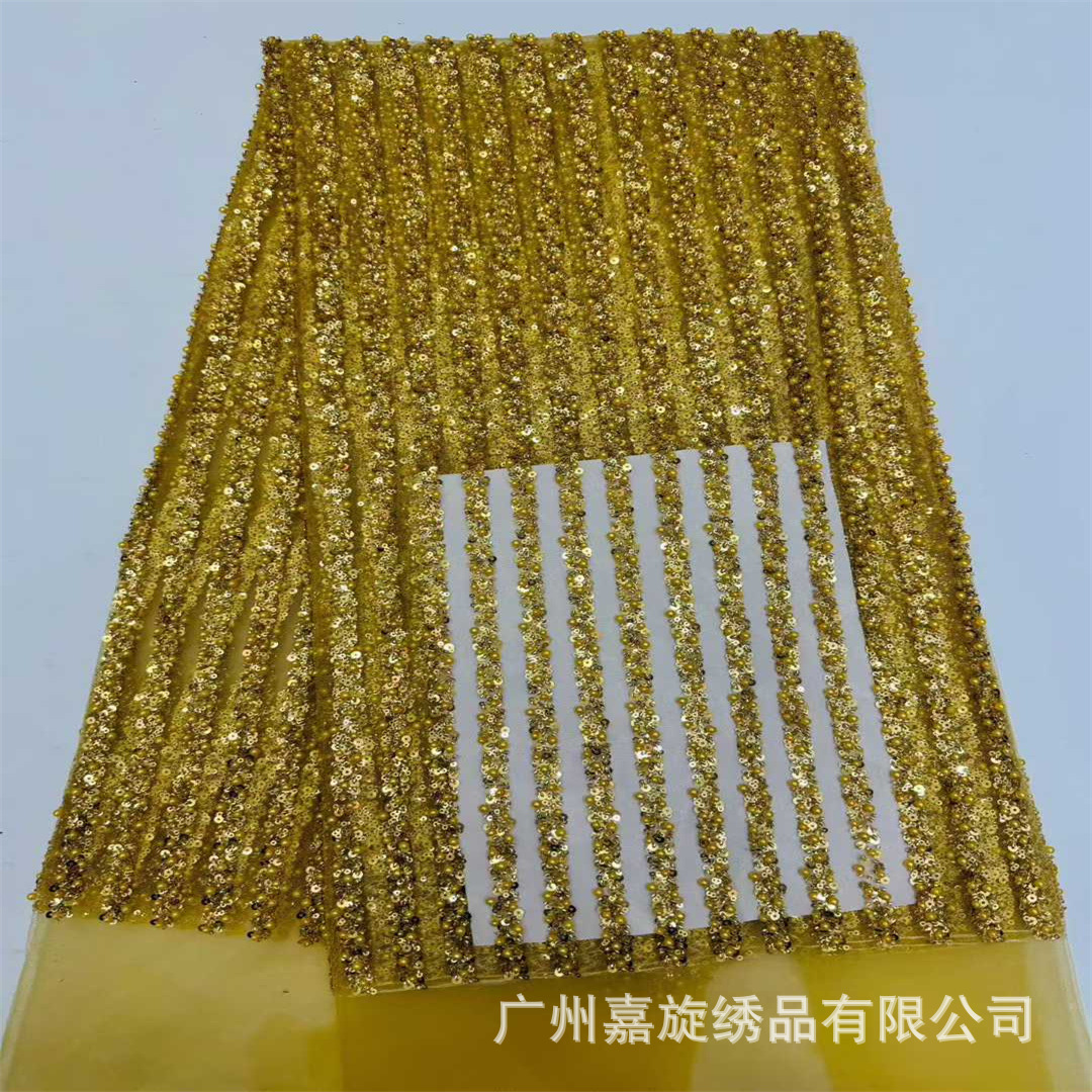 Vestido de novia de lujo con lentejuelas bordadas y rayas verticales de alta gama, tela de encaje a la moda.