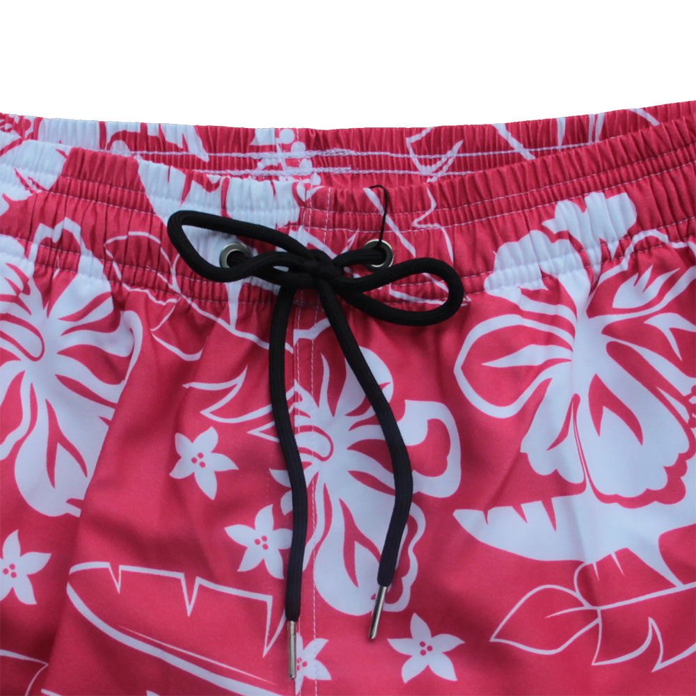Herrbadeshorts med blommigt mönster och foder för stranden_voghion.com