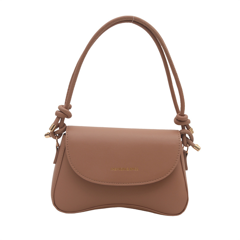 Hong Kong retro color sólido bolso de mujer de estilo extranjero 2025, primavera coreana de textura bolso de hombro de moda bolso de moda