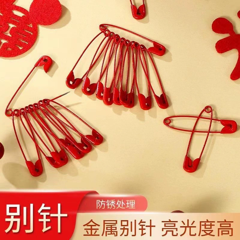 Большая красная булавка для свадьбы