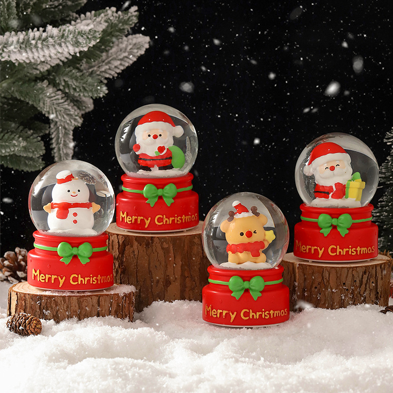 Una variedad de regalos de decoración de Navidad Navidad iluminante bola de cristal caja de música ventana diseño de velas lámparas de viento árbol de Navidad