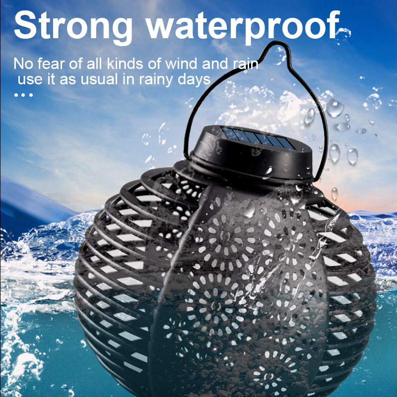 Transfronteriza nueva lámpara de linterna de llama solar al aire libre de ratán redondo linterna patio colgante atmósfera araña