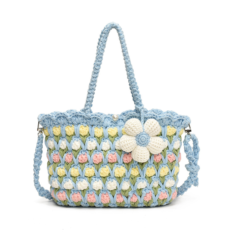 Nuevo paquete infantil transfronterizo ganchillo hecho a mano flores dulces bolsas de hombro para hombres y mujeres viajes de vacaciones bolsas de cestas de verduras portátiles