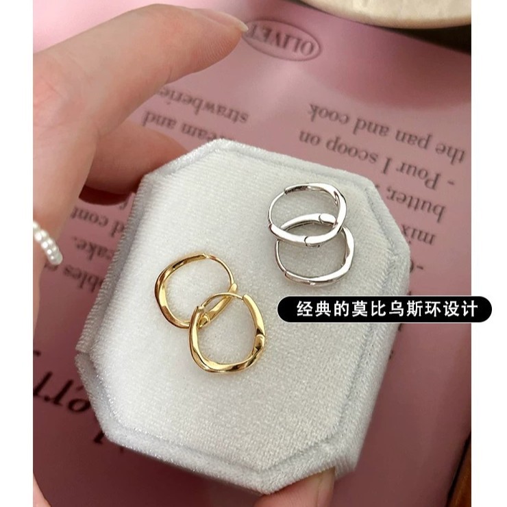 Smooth and compact twisted hoop earrings, new European and American style, elegant Möbius earrings, factory supply