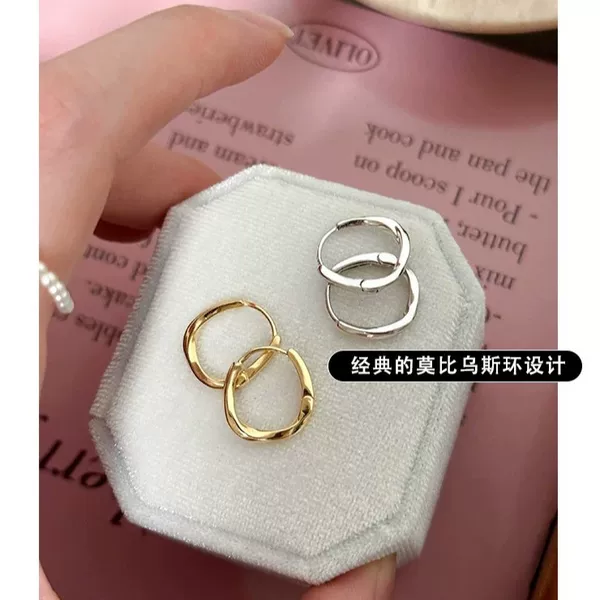 Smooth and compact twisted hoop earrings, new European and American style, elegant Möbius earrings, factory supply