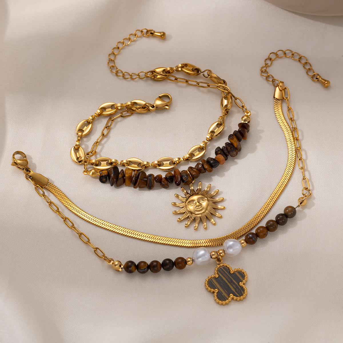Tina Europa y los Estados Unidos pulsera de acero inoxidable nicho de cuatro hojas de sol cadena cubana cadena de hueso de serpiente cruzada fronteriza joyería de mano caliente mujer