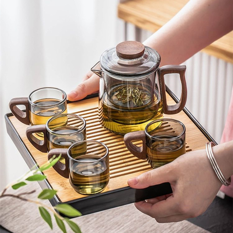 Oficina de vidrio transparente de borosilicato mango de madera tetera de flores hogar simple separación de Té de doble propósito olla