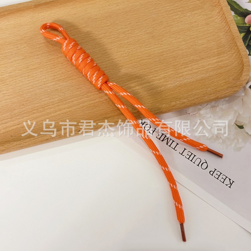 編みカバンのストラップの螺旋の結び紐のiuは鍵のボタンのネットの赤い色の結びの縄の装飾の部品を結びます。