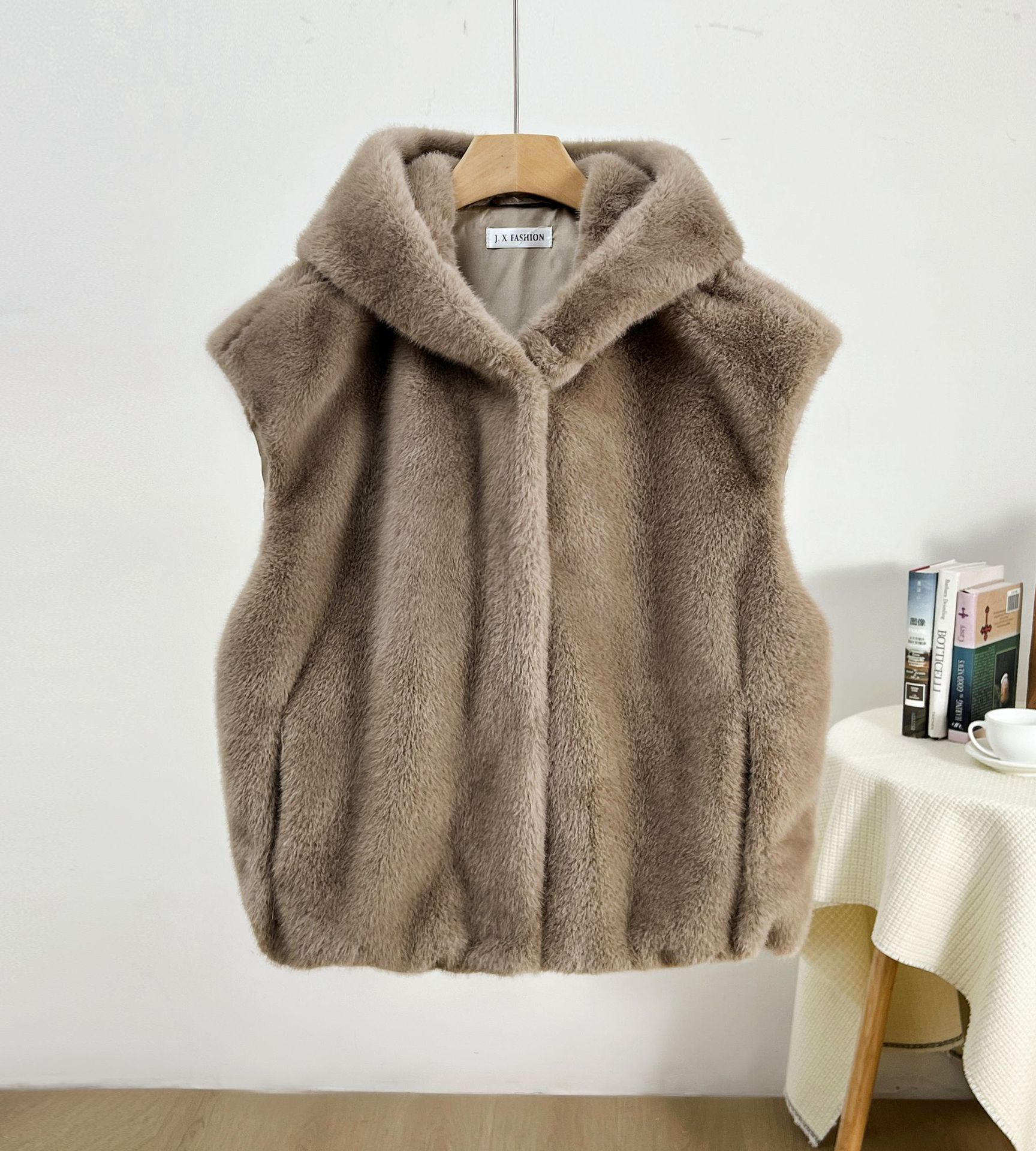 Primavera nuevo chaleco con capuzas de imitación de chaleco de botón una chaqueta de moda al por mayor corta