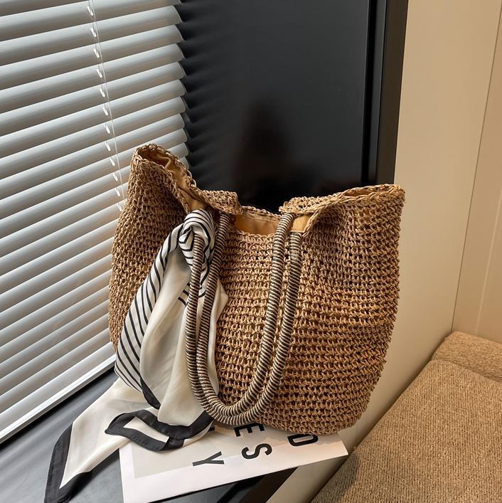 Bolsos de paja populares de verano para mujer 2025 nuevo bolso de tote hueco tejido más vendido bolso de mujer de viaje de gran capacidad