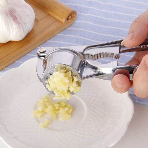 Four-in-one manual garlic press, garlic masher, garlic masher, fish scale scraper, bottle opener, walnut clip, manual garlic punch