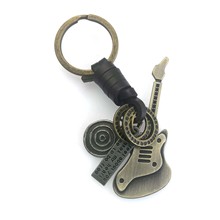 复古皮绳钥匙扣手工挂件饰品古铜吉他车用钥匙创意牛皮挂饰