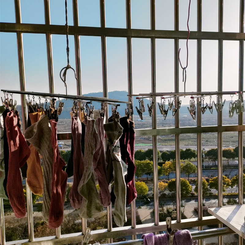 Gancho a prueba de viento de acero inoxidable retráctil percha de ropa plegable 20 clip multi-clip percha de ropa interior percha calcetines tendedero al por mayor