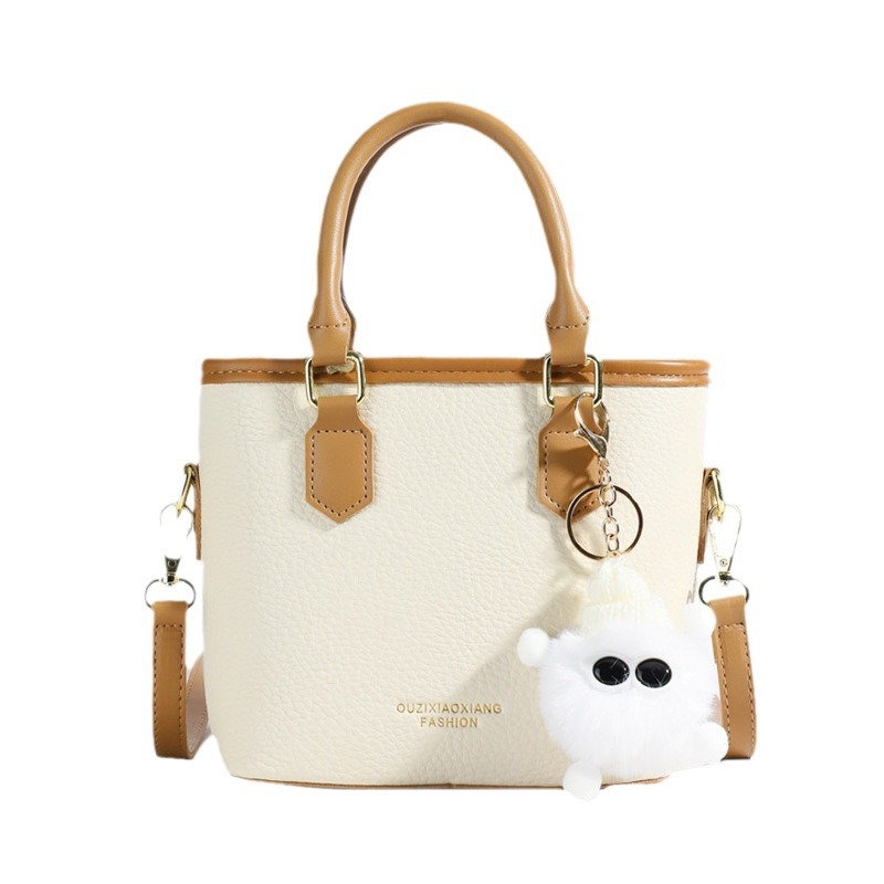 Bolso transfronterizo para mujeres 2024 nuevo bolso de mochila de moda versátil nicho de diseño popular simple bolso de cubo de mano