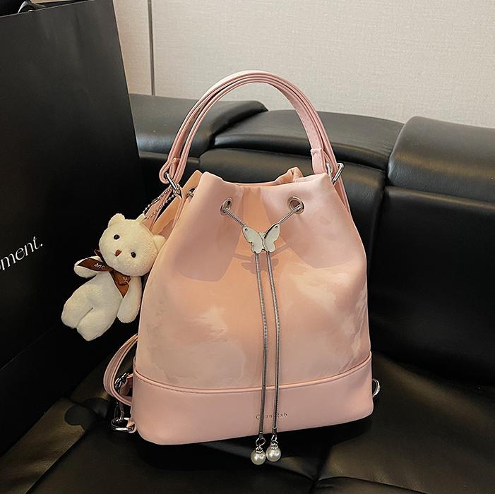 Mochila multiusos de moda para mujer 2025 nuevo estilo casual moda bandolera estilo universitario todo fósforo alta sensación bandolera