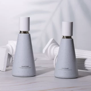 新品仿石撒点化妆品玻璃瓶120ml按压泵水乳瓶锥形瓶50g膏霜瓶包装