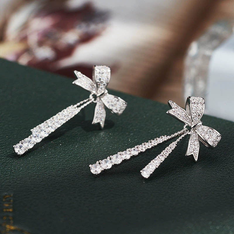 Bow dangle earrings, silver needle posts, light luxury crystal pendant, elegant bow design