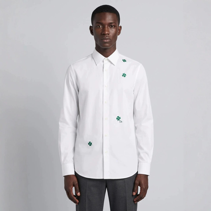 New, high-end, and uniquely designed French-style white embroidered four-leaf clover shirt with a touch of understated luxury New, high-end, and uniquely designed French-style white embroidered four-leaf clover shirt with a touch of understated luxury