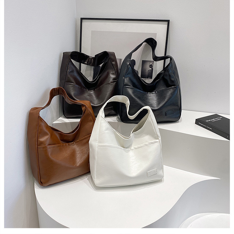 Large-capacity female 2024 new autumn and winter soft leather bucket bag, commuter tote bag, college student class single-shoulder bag undefined