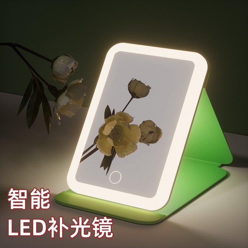 Espejo de maquillaje LED espejo de belleza plegable espejo de maquillaje de escritorio carga con luz de tres colores espejo de relleno de luz entrega al por mayor