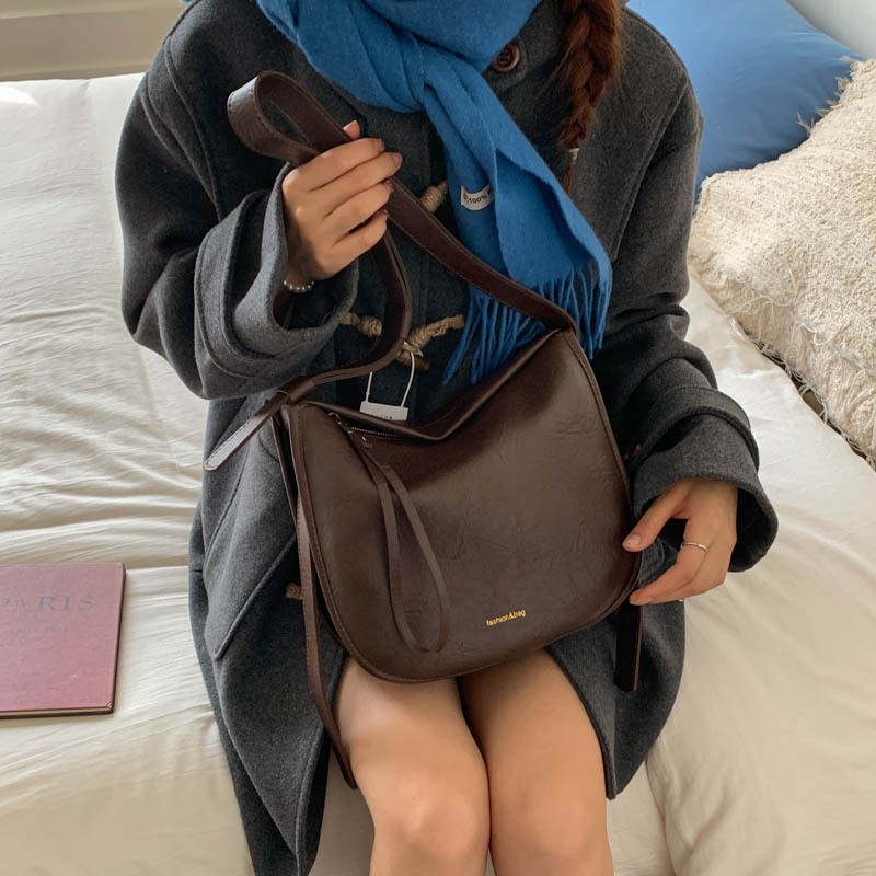 Bagos de hombro anchos nichos de alta calidad para mujeres 2025 nuevo paquete de cubo de viaje de gran capacidad