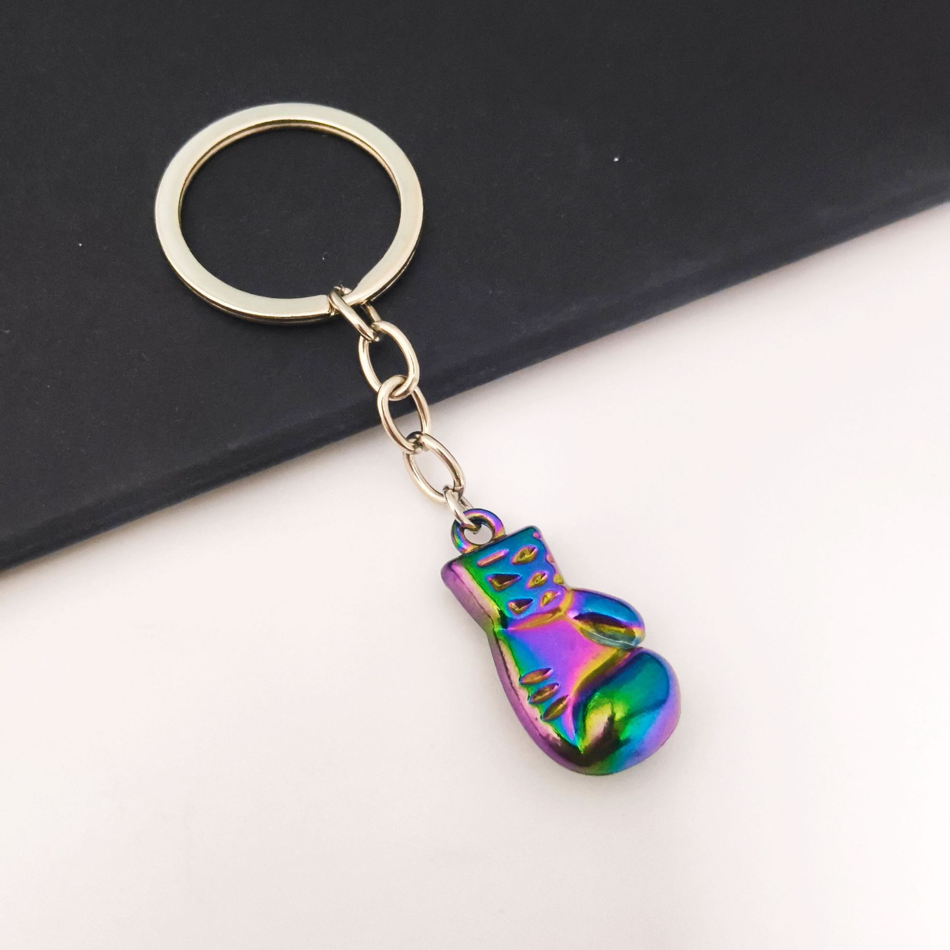 Serie de oro de aleación de venta transfronteriza caliente fútbol béisbol rugby sombrero hechicero puño llavero colgante mochila