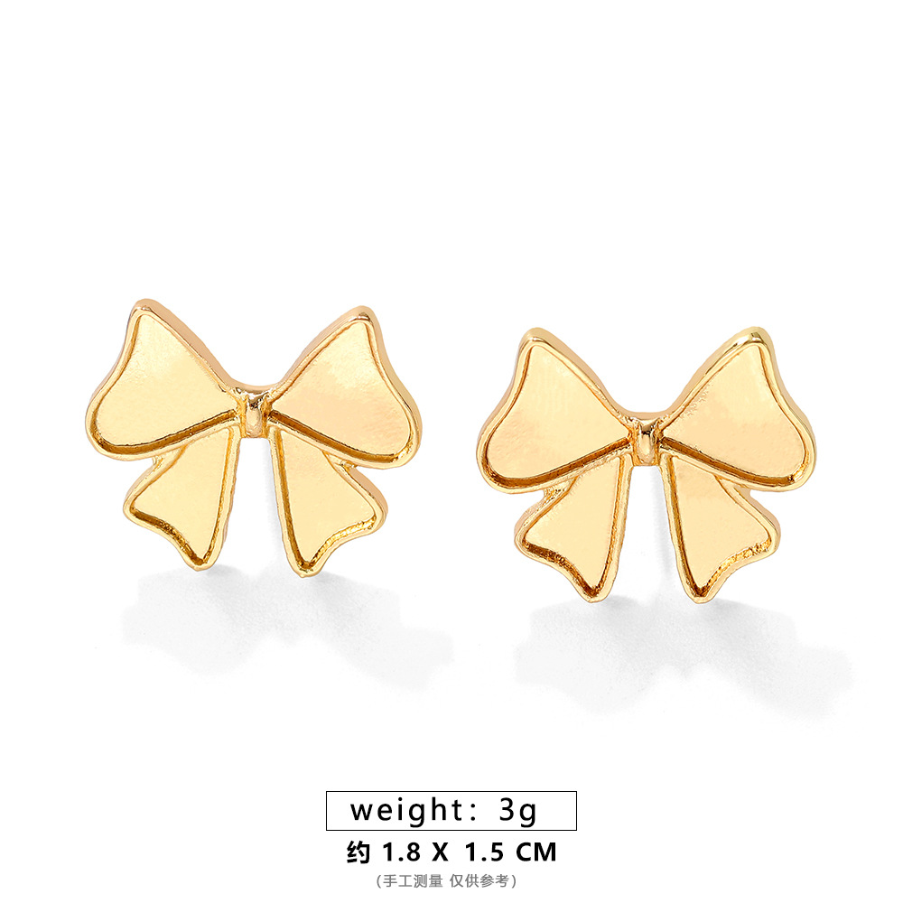 ALEH046-A gold bow earrings