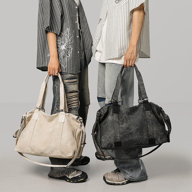 Meilad retro alta sensación bolso de gran capacidad de viaje corto bolso de mano casual versátil mochila de hombro