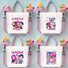 猎魔女团卡通印花新款粉色帆布手提包单肩包斜挎包