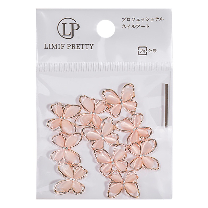 Uñas de cristal gato ojo mariposa aleación joyería en línea celebridad uñas hueco mariposa desgaste accesorios de uñas al por mayor