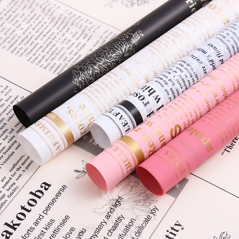 现货批发草本植物鲜花包装纸英文防水纸礼物包花纸花店花束资材