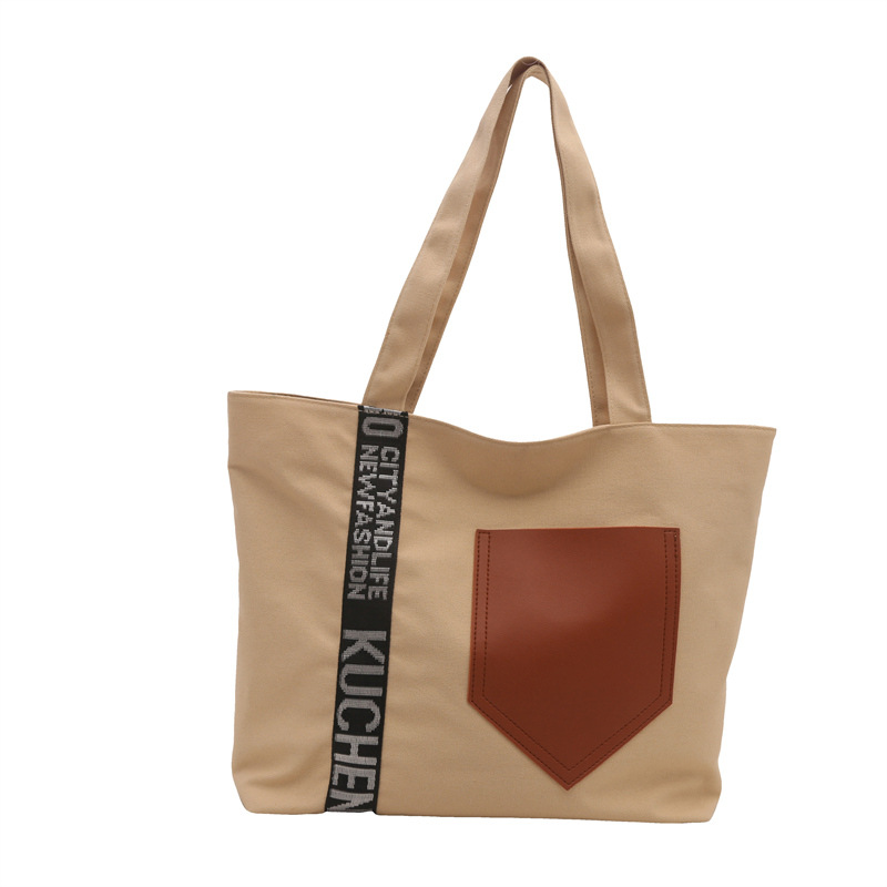 Bolso de mujer 2024 invierno nuevo bolso de gran capacidad de transporte de lona bolso de brazo de moda simple bolso de hombro