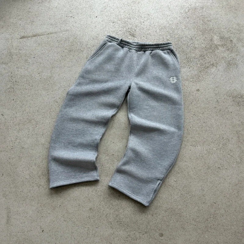 ヨーロッパとアメリカのクロスボーダー刺繍ジッパースウェットパンツカジュアルパンツハイストリートヒップホップラップストリートアメリカンサイズの男性と女性のスウェットパンツ卸売|undefined