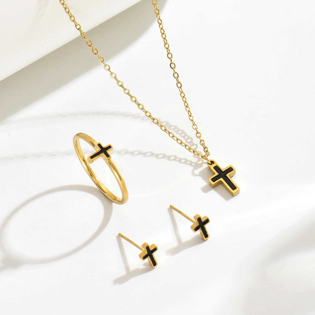 Set di gioielli croce geometrica con design a goccia d'olio_voghion.com